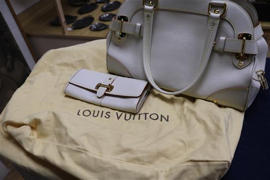 A Louis Vuitton Le Radieux handbag, cream with burgundy trim and matching purse